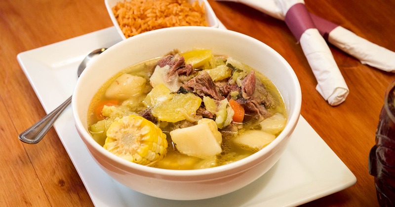 Beef soup with corn potatoes and rice