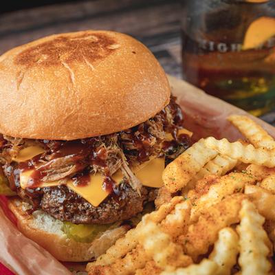 Wacky burger with pulled pork and fries