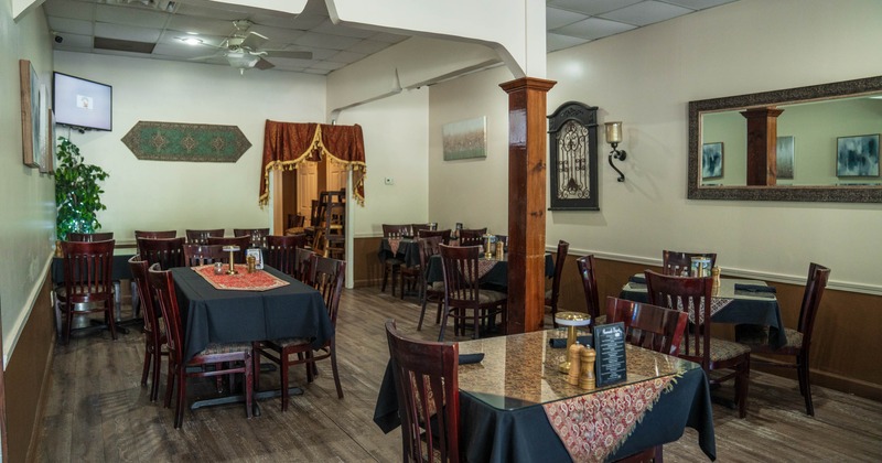 Interior, tables and chairs ready for guests