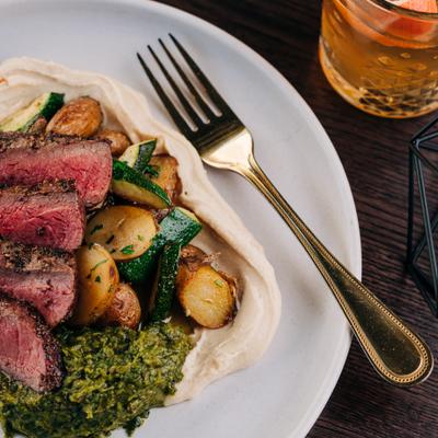 Grilled Flat Iron, White Bean Hummus, Bell Peppers, Zhoug, GF, Vegan Adaptable.