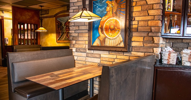 Interior, booth seating, framed picture on the wall