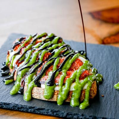 Bacon, pesto, and balsamic cheesy toast.