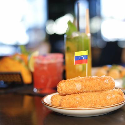 Bread dough sticks stuffed with white cheese.