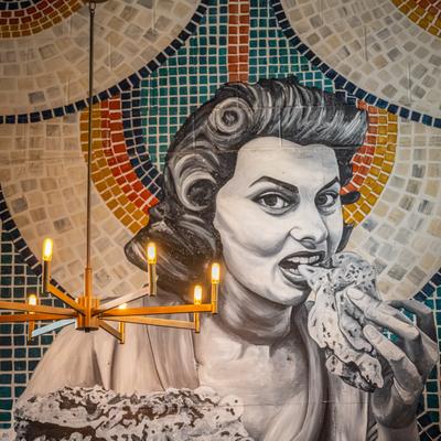 Decorated wall, mosaic, ceramics and mural.