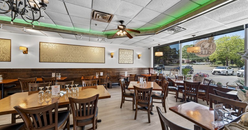 Interior, tables and chairs ready for guests