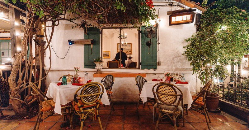 Patio tables, set and ready for guests