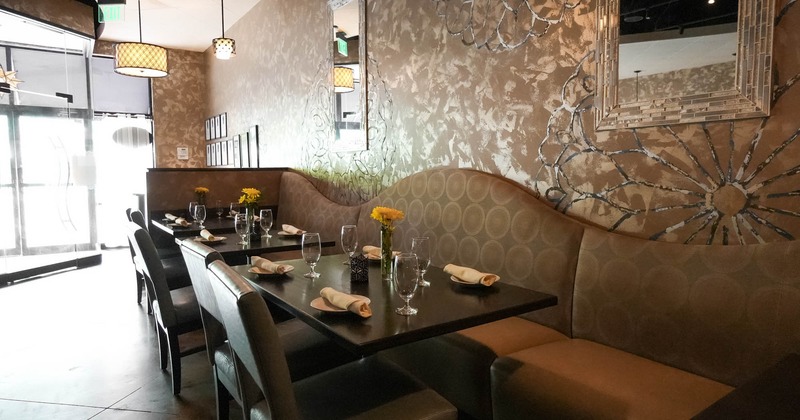 Interior, banquette seating and dining tables with chairs