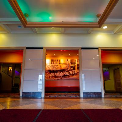 Interior, lobby space with three entrances.