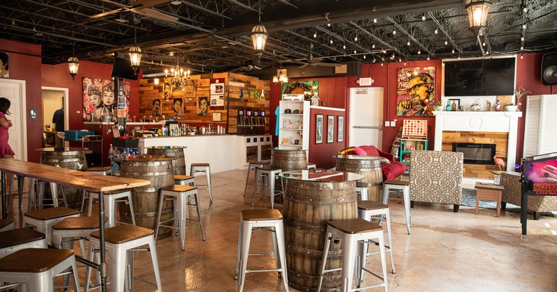 Interior, bar area with a barrel tables