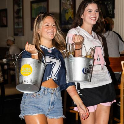 Staff member serving drinks.