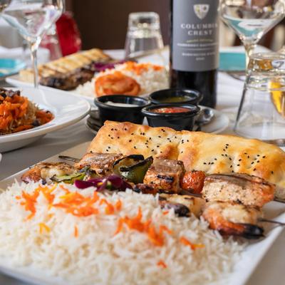 Various served meals on the table.
