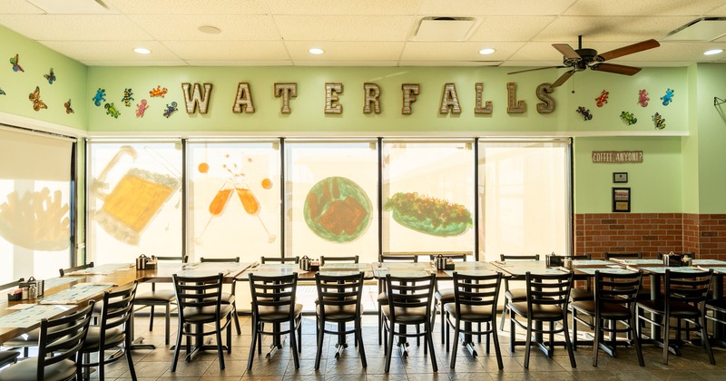 Spacious interior dining area with tables set for guests