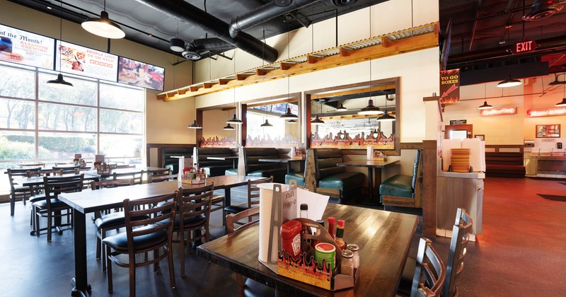 Interior, tables, chairs, windows, LED screens, lights, ventilation