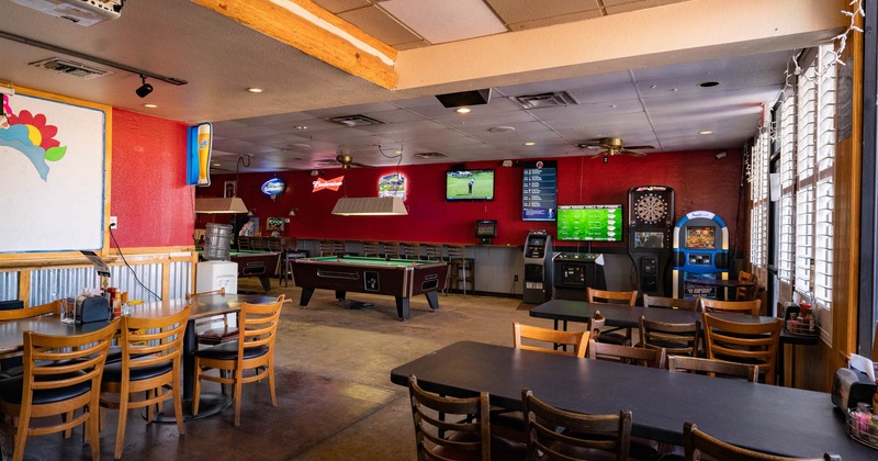 Interior, dining area, gaming room in the back