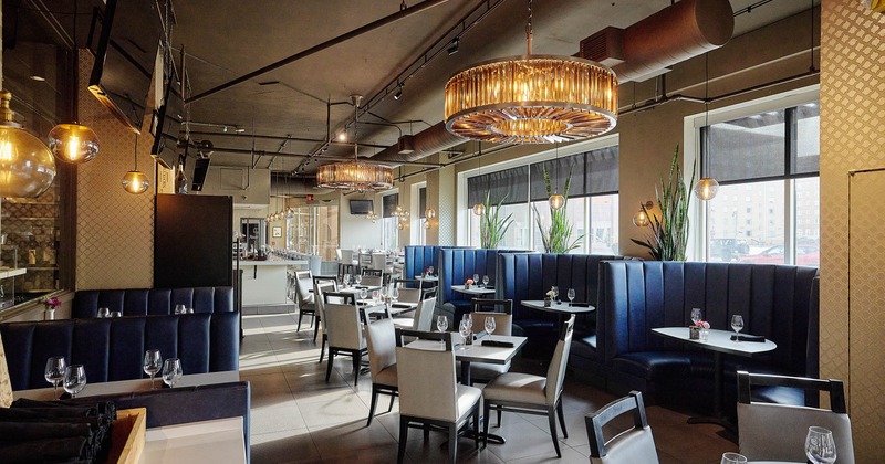 Interior, dining area, regular and ''U'' shaped booths with tables, regular tables for four
