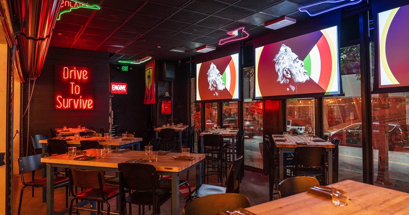 Interior, modern design of the restaurant's dining area with set dining tables