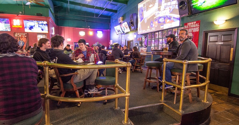 Interior, guests sitting and enjoying their drinks
