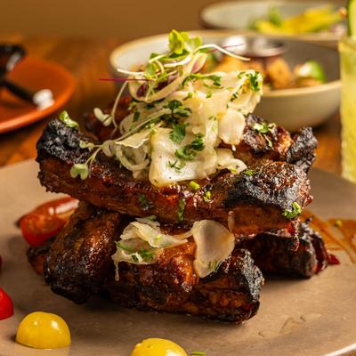 Stacked grilled ribs.