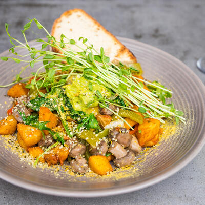 Salad with meat and mixed vegetables, bread on the side