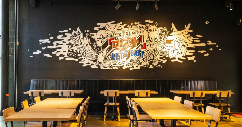 Interior, dining tables, seating and mural art