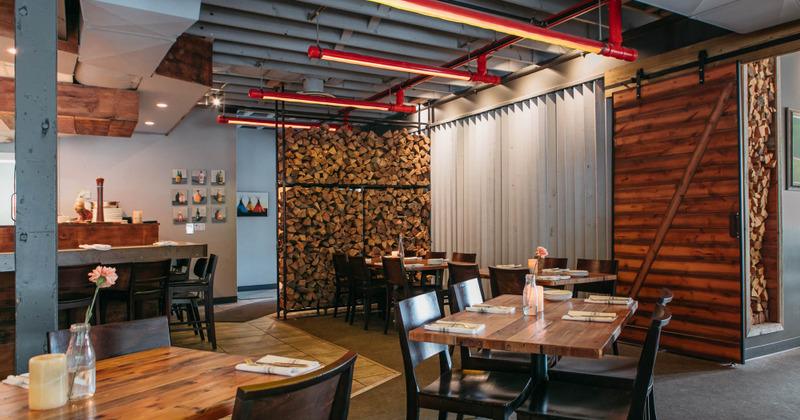 Dining area, tables set with tableware
