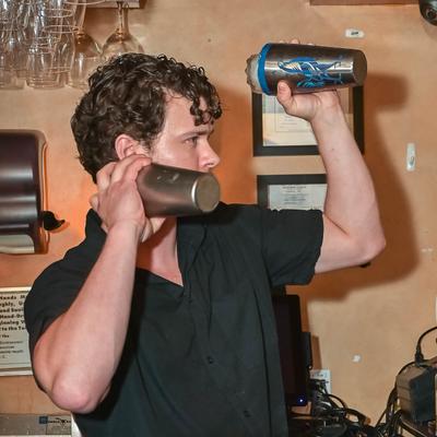 Bartender making cocktails.