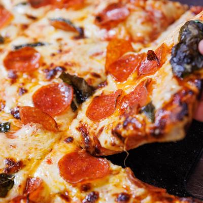 Close up of a pepperoni pizza.