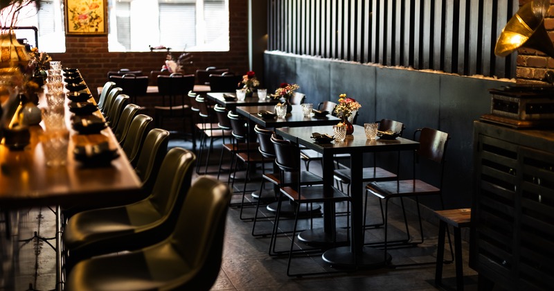 Interior, diner area, tables, chairs, wide view