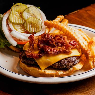 Shipleyburger with Cheese and Bacon served with crinkle fries.