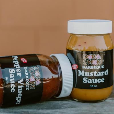 Doko Smoke BBQ Pepper Vinegar Sauce and Mustard Sauce.