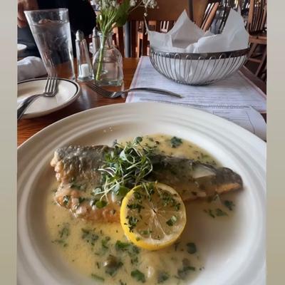 Sea bass filet in sauce.