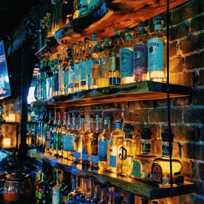 Interior, bar shelves with liquor