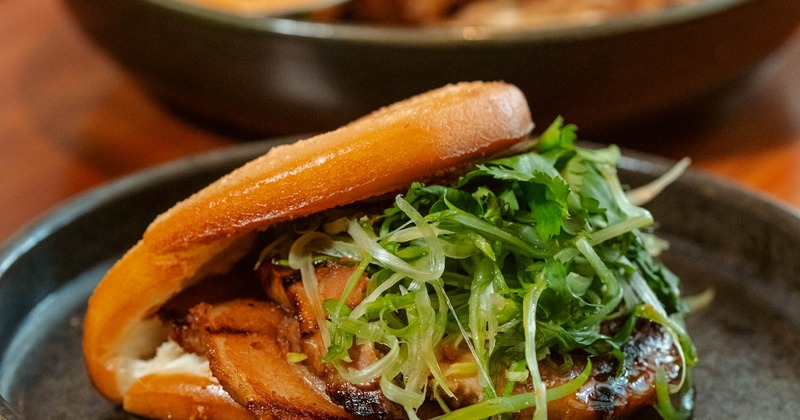 Pork belly bun with arugula