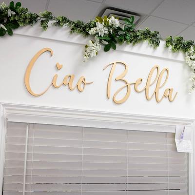 Cia Bella lettering.