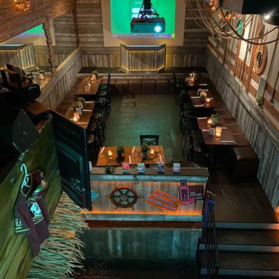 Interior, room for dining designed to look like boat cabin