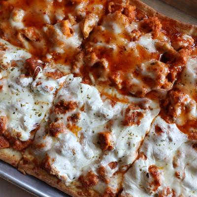 Square chicken pizza, with buffalo and ranch dressing.