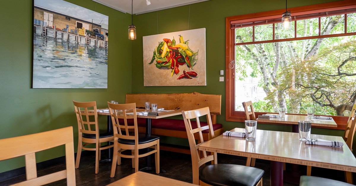 Nicely done interior dining area with set tables