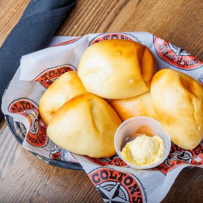 Fresh bread rolls with butter.