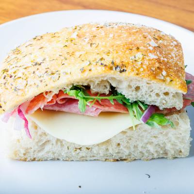 Italian Focaccia sandwich, served on a plate.