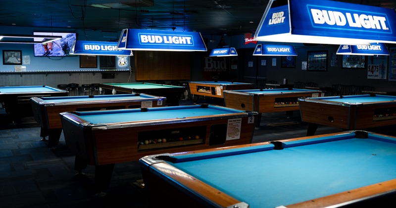 Interior, game room, pool tables, wide view