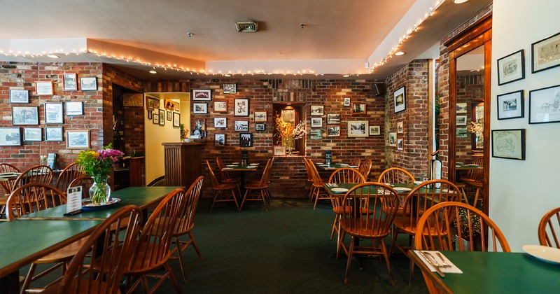 Nicely done interior dining area with set tables ready for guests