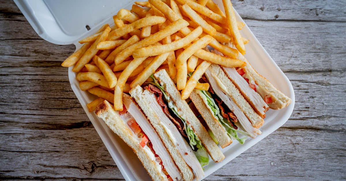 Turkey Club Sandwich and fries