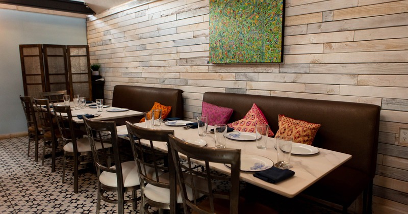 Interior, seating area, tables ready for guests