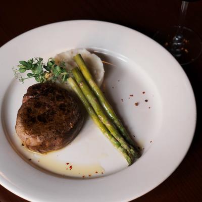 Filet Mignon, served with mashed potatoes and asparagus.