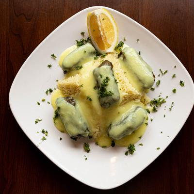 Stuffed Grape Leaves, with lemon sauce.