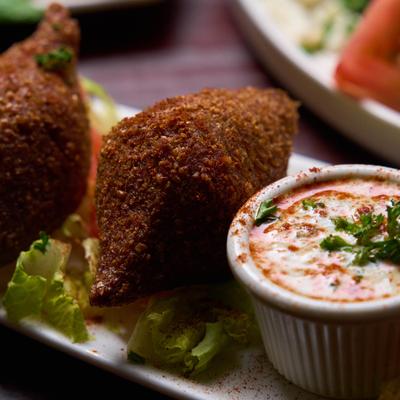Deep fried ground lamb and beef, with dipping sauce.