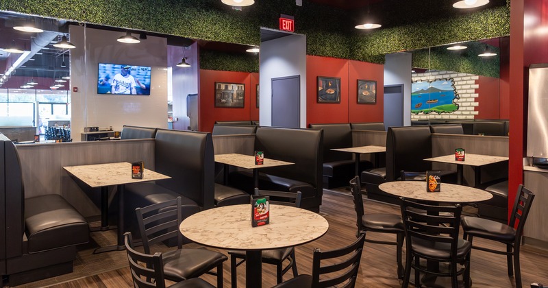 Interior space, dining area with dining tables and booths