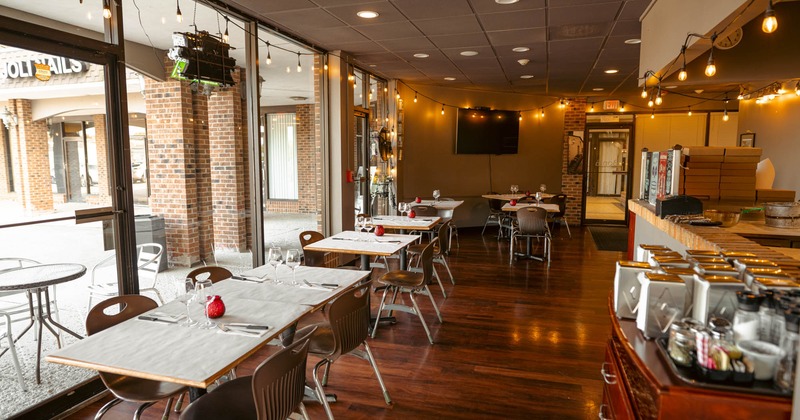 Interior, dining tables by the windows