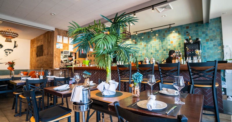 Interior, tables ready in the dining area