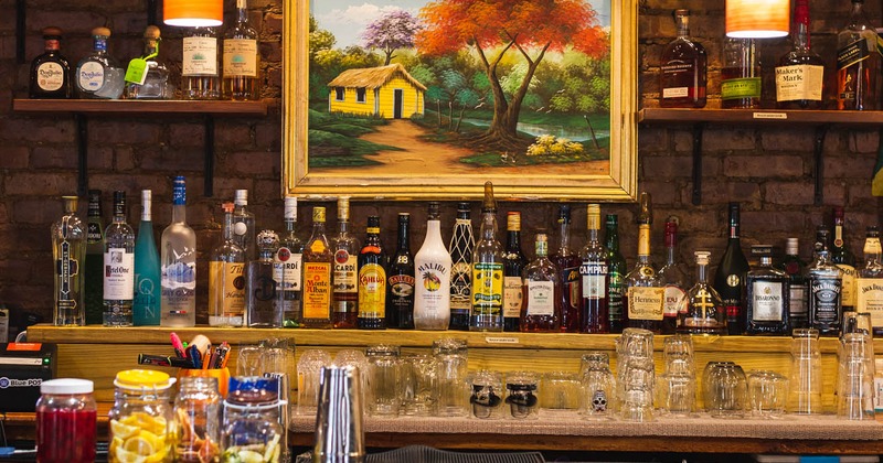 Various liquor bottles and glasses